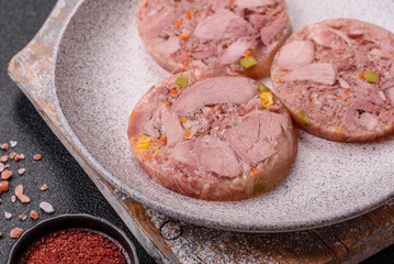 Homemade brawn with salt, spices, herbs and vegetables