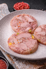 Homemade brawn with salt, spices, herbs and vegetables