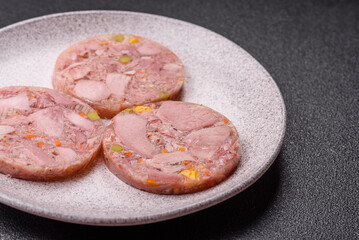 Homemade brawn with salt, spices, herbs and vegetables