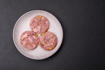 Homemade brawn with salt, spices, herbs and vegetables