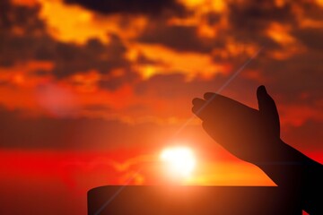 New Year concept sunrise sun background and  praying hands
