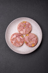 Homemade brawn with salt, spices, herbs and vegetables