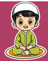 Little muslims boy sitting on carpet 