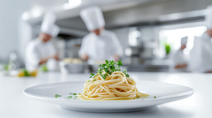  Elegant Plated Spaghetti Dish in a Professional Kitchen