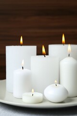 Beautiful composition with candles on the table