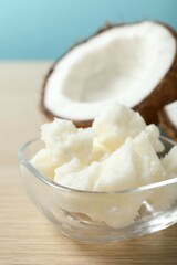Bowl of coconut oil on table