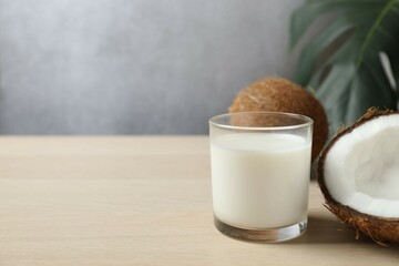 Glass of milk with coconuts on the table