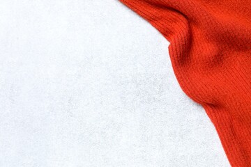 Orange fabric on gray background 