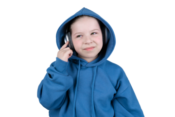 Girl in blue hoodie listening to music on headphones, putting her right hand to her ear. Studio portrait on transparent background. Lifestyle concept