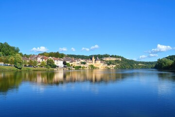 Fototapeta premium Charming Castle Town: Discover the Ancient Village of Castelnaud-La-Chapelle in the Heart of Dordogne, France