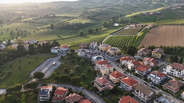 Aerial photo of houses, roofs, streets and greenery and a beautiful view in the Italian town of Roseto degli Abruzzi in the province of Teramo.


