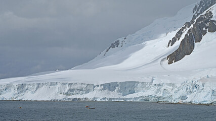 A submersible from an expedition cruise ship surfaces off Wiencke Island, Antarctica.