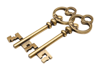 Ornate vintage brass keys on white