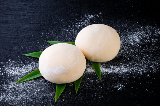 Daifuku mochi vanilla dessert on a dark background