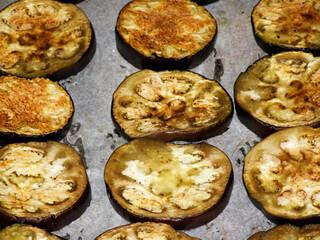 Round slices of baked eggplant