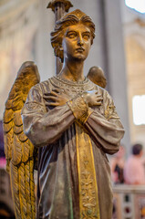 Fototapeta premium Rome, Latium, Italy - July 30th 2024: Statue of an angel located at the Basilica of San Pietro in Vincoli