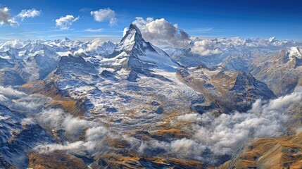Obraz premium A panoramic aerial view of the Gornergrat train traveling through the Swiss Alps, with the Matterhorn dominating the landscape