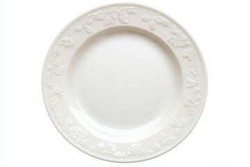 Empty white ceramic plate on a white backdrop viewed from above