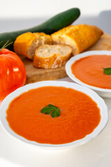 Famous vegetables soup from Cordoba, Andalusia salmorejo served cold in restaurant for lunch as starter dish close up