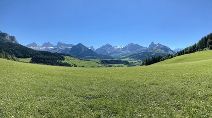 Obraz premium The Swiss Alps at their finest Rosenlaui in summer with the dramatic Wellhorn, the peaceful Reichenbach River, and a clear, bright blue sky