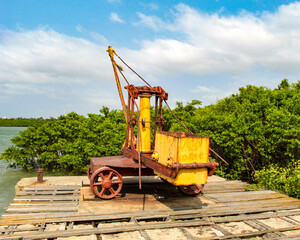 A very old winch on the pier of a port in Tamancão, in the city of São Luis Maranhão, northeast...