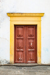 Old wooden gate in colonial style, in Alto da Sé, in the city of Olinda, Pernanbuco, Brazil