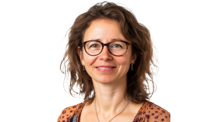 Woman with curly hair and glasses smiles warmly