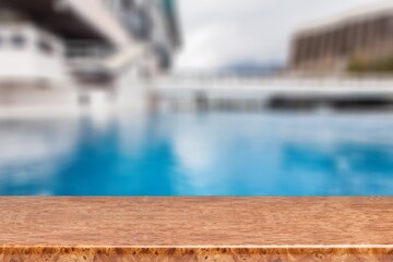 Wooden top with Swimming pool background