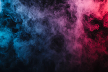 Obraz premium A swirling blend of blue and pink smoke against a dark background, creating an abstract effect.
