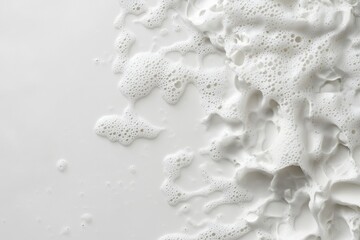 Abstract white background showing foaming bubbles and creamy liquid