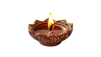 Traditional oil lamp burning with a vibrant flame