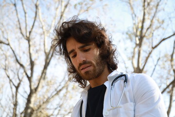 Male Doctor Gets Scared After Seeing A Patient Outside In The Hospital Park