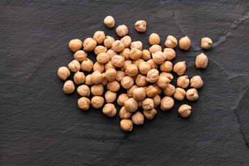 Cicer arietinum - High quality raw chickpeas scattered grains.