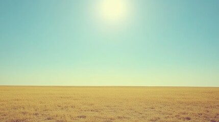 Obraz premium Golden wheat fields stretching into the horizon, warm sunlight and a clear blue sky, ample copy space.
