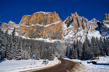 Beautiful panoramic view to the Sellaronda - the ski circuit around the Sella group in Dolomites, Italy - Badia, Gherdeina, Fascia. Extraordinary snowy peaks of the dolomites, southern Alps.