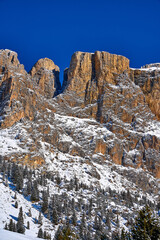 Beautiful panoramic view to the Sellaronda - the ski circuit around the Sella group in Dolomites, Italy - Badia, Gherdeina, Fascia. Extraordinary snowy peaks of the dolomites, southern Alps.