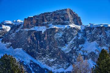 Beautiful panoramic view to the Sellaronda - the ski circuit around the Sella group in Dolomites, Italy - Badia, Gherdeina, Fascia. Extraordinary snowy peaks of the dolomites, southern Alps.