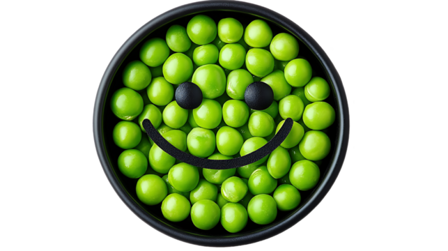Green peas arranged as a smiley face in a bowl.  Possible use Food photography, healthy eating, or a playful food concept - Powered by Adobe