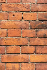 Obraz premium Empty brick red wall. background of a old brick house.