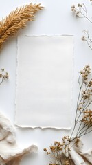 Blank Paper Surrounded By Dried Flowers And Pampas Grass