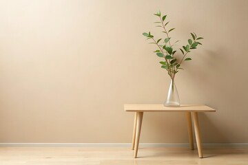 Fototapeta premium Simple Wooden Table with Greenery in a Clear Vase Against a Neutral Wall