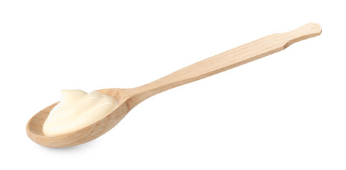 Tasty mayonnaise sauce in wooden spoon isolated on white