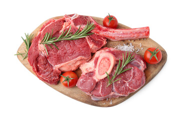 Pieces of raw beef meat, spices and tomatoes isolated on white