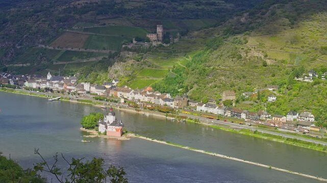 Rising aerial view over a small riverside city along the romantic Rhine Valley, Kaub, Germany