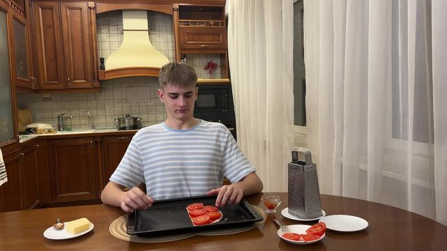 Watch as fresh ingredients come together to create a tasty pizza in this simple cooking tutorial.