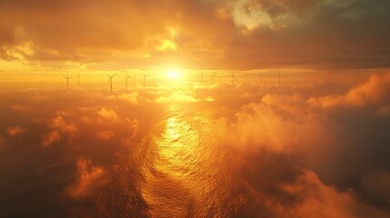 Naklejka premium Aerial view of offshore wind farm at sunrise, turbines emerging from ocean mist, golden light reflecting on blades