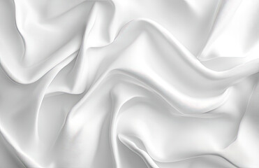 Obraz premium A smooth, white satin fabric draped, showcasing elegant folds and a glossy surface.