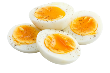 Four egg yolks with pepper sprinkled on top, isolated