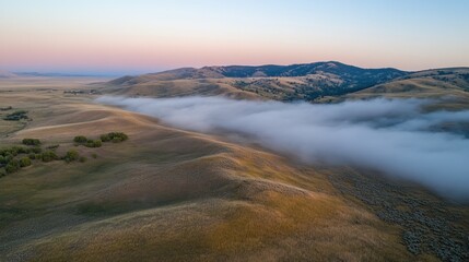 Misty Morning in the Montana Valley: Breathtaking Aerial View of Rolling Hills and Serene Fog