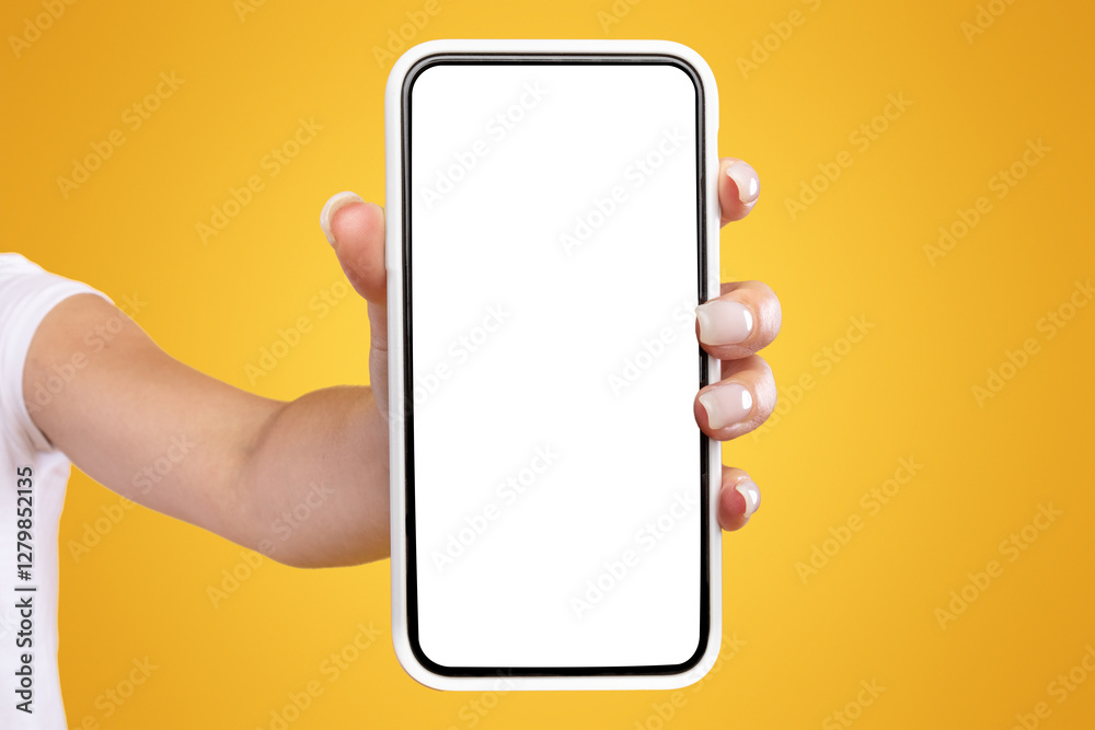Poster trendy mobile phone. closeup of female holding smartphone with white empty screen in hand, showing d